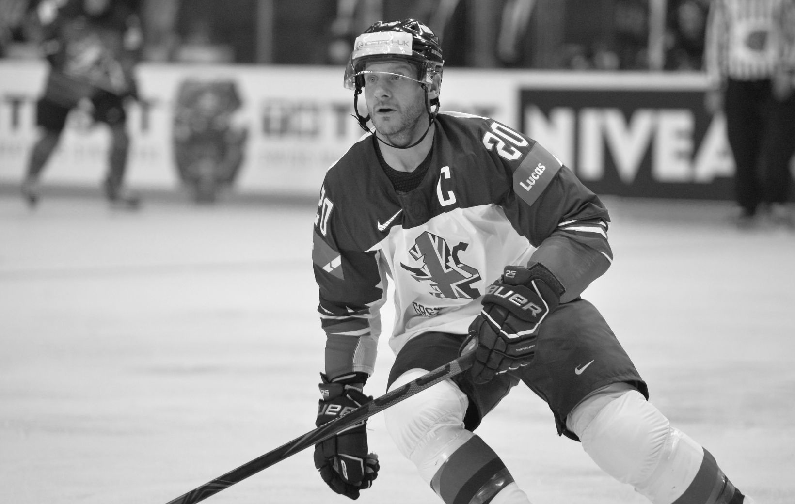 Ice hockey player on the rink during a game.